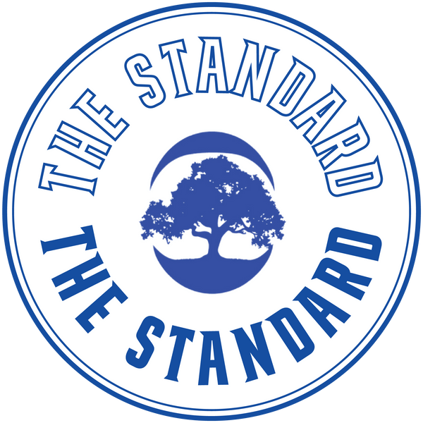 Circular blue and white 68 Oak Collective membership logo featuring an oak tree and the text “The Standard.”