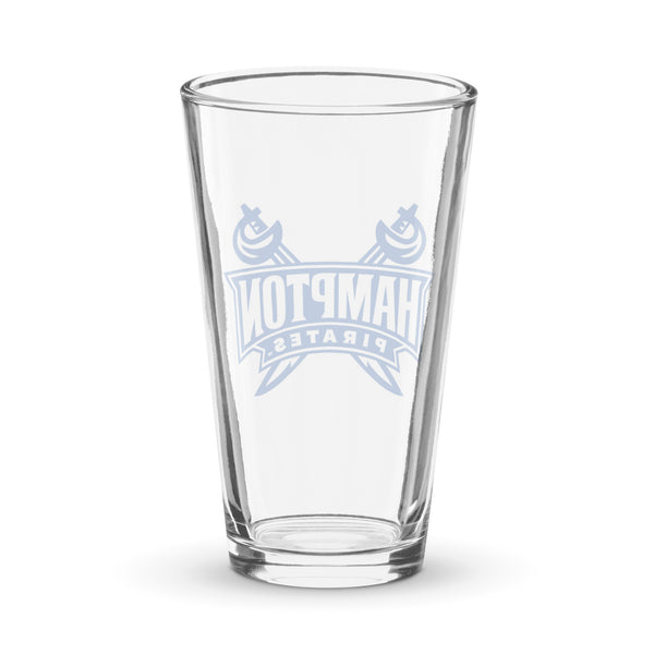Clear shaker pint glass with blue Hampton Pirates logo on a white background