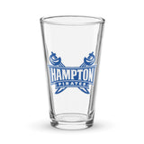 Clear shaker pint glass with blue Hampton Pirates logo on a white background